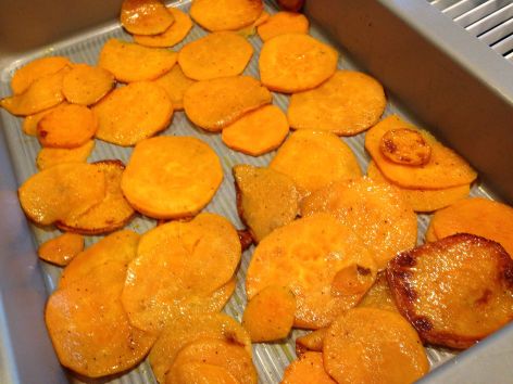 Sweet potatoes should mostly line the the bottom of the baking pan.